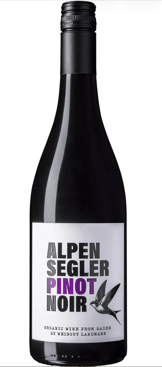 Flaska rött vin, Alpen Segler Pinot Noir, med vit etikett och svalaillustration